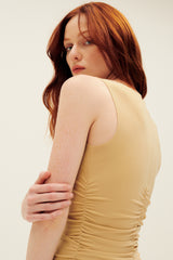 Norma Kamali Sleeveless Pickleball Mini Dress in Sand 